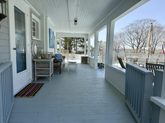 168 Ocean Ave, Kennebunkport, ME 04046 - wooden deck featuring a porch