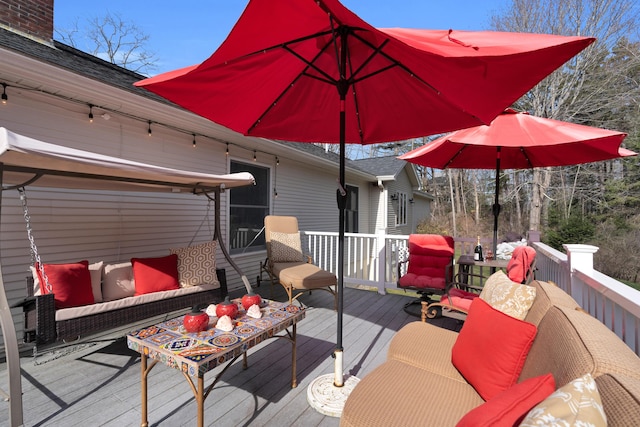 deck with an outdoor hangout area