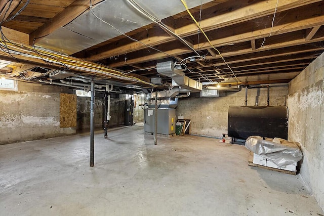 basement featuring heating fuel and heating unit