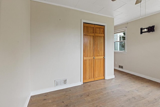 10 Field St, Bangor, ME 04401 - unfurnished bedroom featuring wood finished floors and baseboards