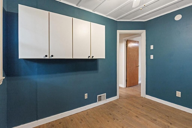 10 Field St, Bangor, ME 04401 - unfurnished room featuring wood finished floors and baseboards