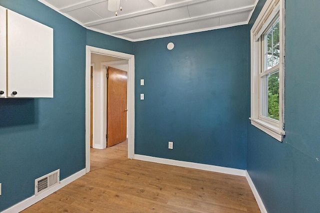 10 Field St, Bangor, ME 04401 - empty room with wood finished floors, baseboards, and a ceiling fan