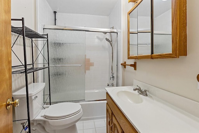 10 Field St, Bangor, ME 04401 - full bath with vanity, toilet, bath / shower combo with glass door, and tile patterned floors