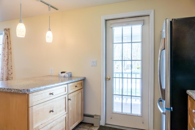 doorway with a baseboard radiator