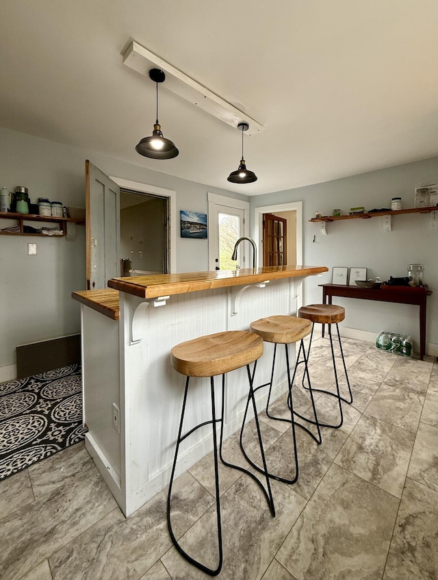 12 Prince Ave, Eastport, ME 04631 - bar featuring pendant lighting and a sink