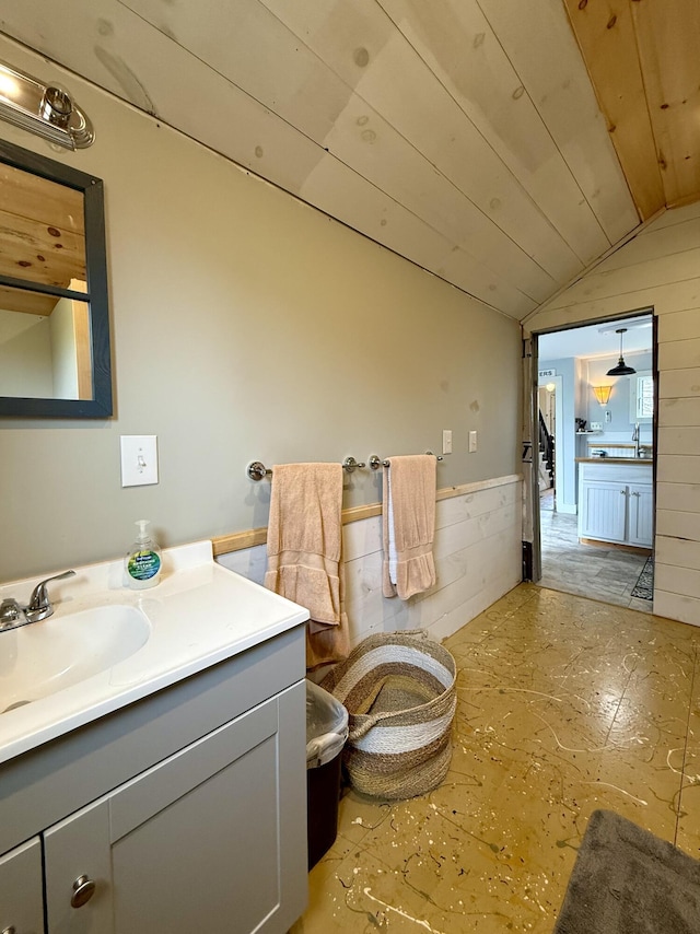 12 Prince Ave, Eastport, ME 04631 - bathroom with vaulted ceiling and vanity