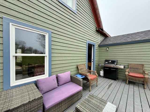12 Prince Ave, Eastport, ME 04631 - wooden deck with a grill and an outdoor living space