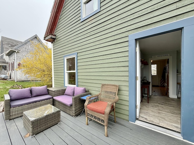 12 Prince Ave, Eastport, ME 04631 - wooden deck featuring an outdoor hangout area