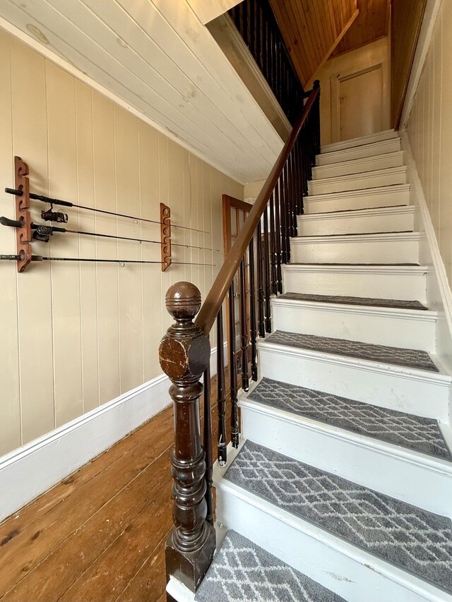 12 Prince Ave, Eastport, ME 04631 - stairs featuring wood-type flooring and wooden ceiling