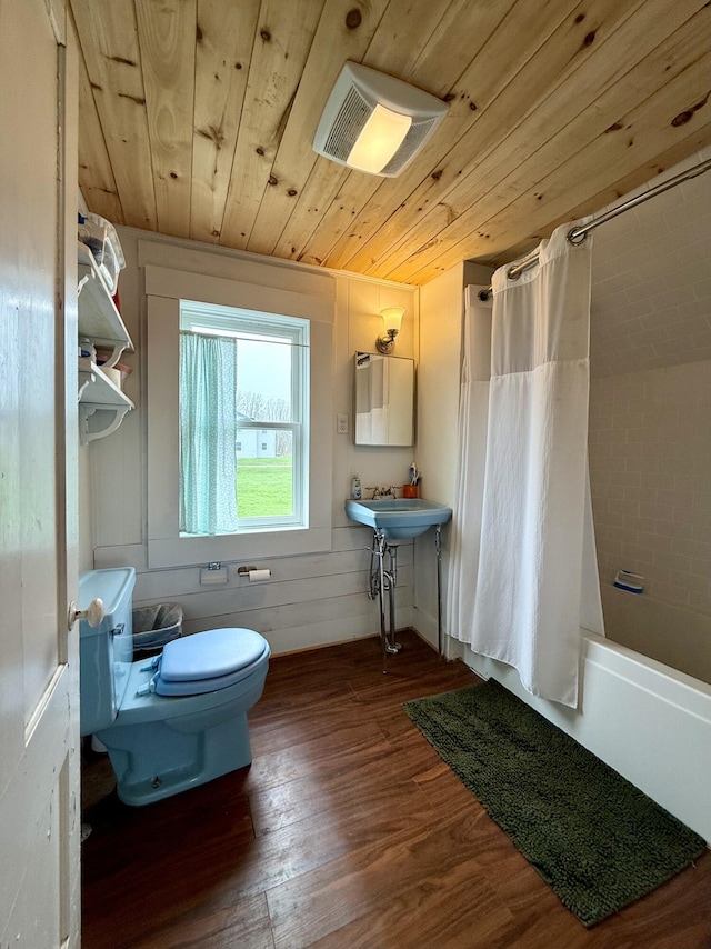 12 Prince Ave, Eastport, ME 04631 - bathroom with wooden ceiling, wood finished floors, toilet, and shower / bath combo