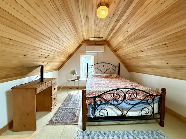 12 Prince Ave, Eastport, ME 04631 - bedroom featuring a wall mounted air conditioner, wooden ceiling, vaulted ceiling, baseboards, and wood finished floors