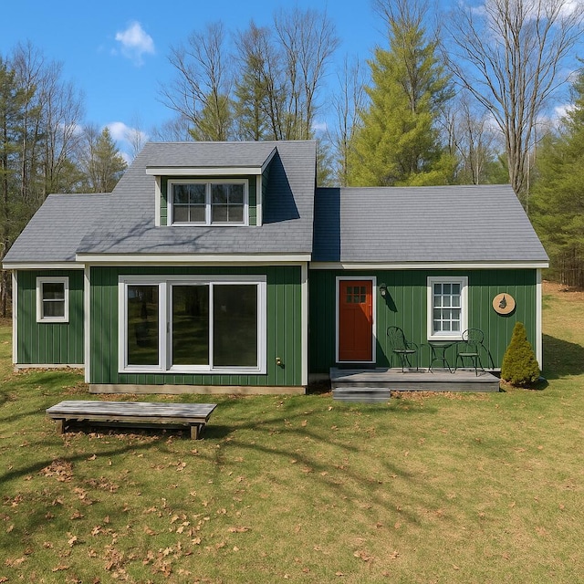 305 Main St N, Searsmont, ME 04973 - view of front of home with board and batten siding and a front lawn