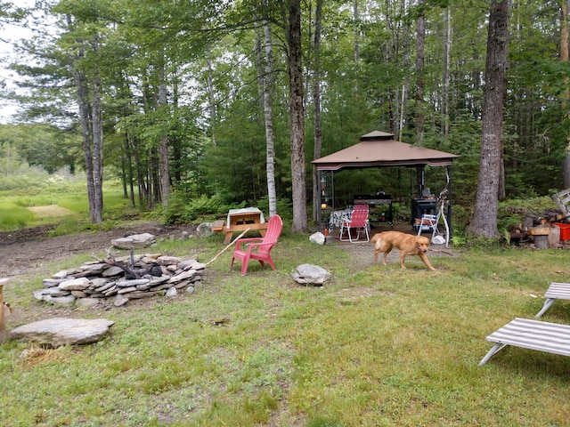 305 Main St N, Searsmont, ME 04973 - view of yard featuring an outdoor fire pit and a gazebo