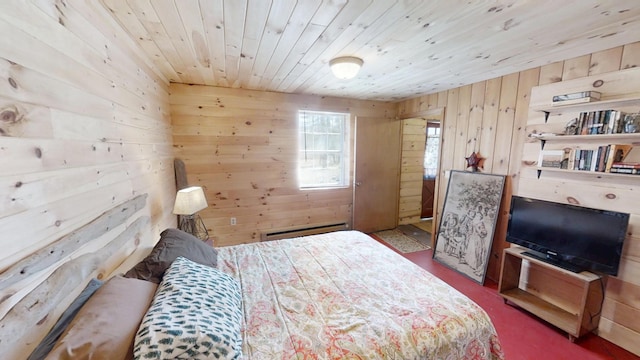 305 Main St N, Searsmont, ME 04973 - bedroom with a baseboard heating unit, wooden walls, and wood ceiling