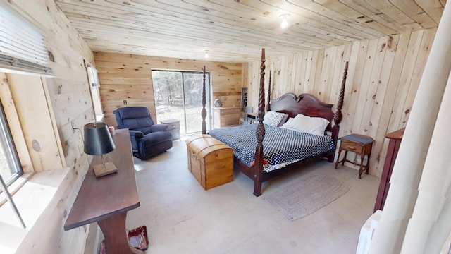 305 Main St N, Searsmont, ME 04973 - bedroom with wooden ceiling, wooden walls, and finished concrete flooring