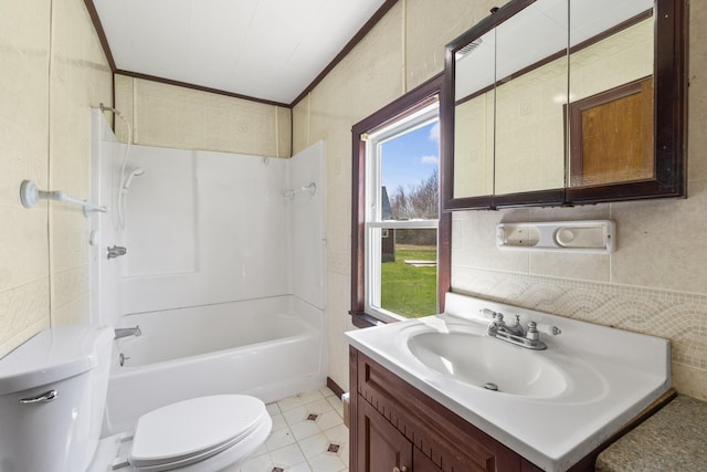full bath with crown molding, shower / bathtub combination, toilet, and vanity