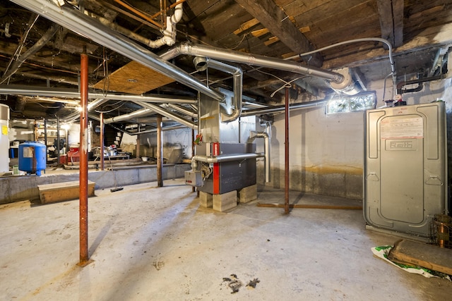 unfinished below grade area featuring heating unit
