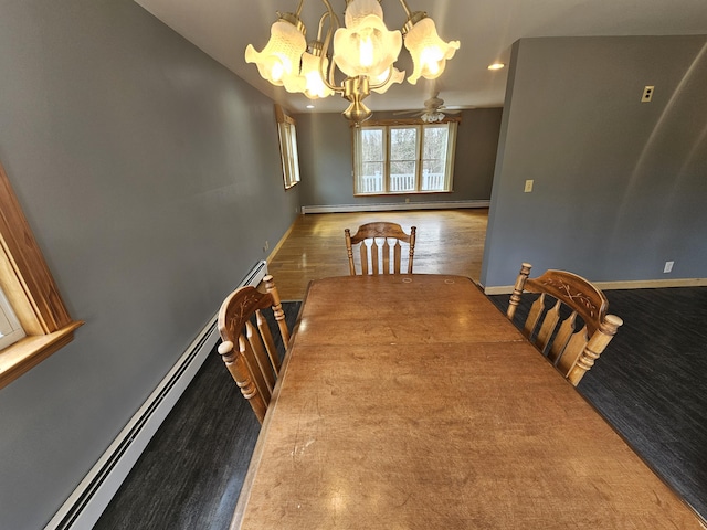 57 Owlsboro Rd, Mount Chase, ME 04765 - dining space with wood finished floors, ceiling fan with notable chandelier, a baseboard heating unit, and baseboards