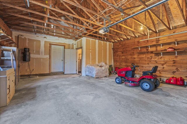 48 Thistle Ln, Sidney, ME 04330 - garage featuring a garage door opener and a central vacuum unit