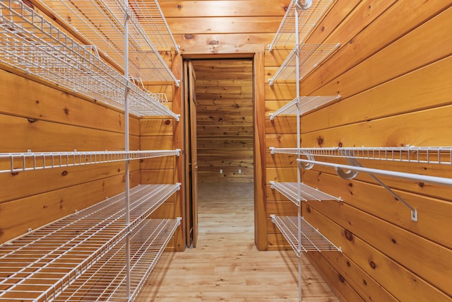 48 Thistle Ln, Sidney, ME 04330 - walk in closet featuring wood finished floors