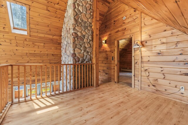48 Thistle Ln, Sidney, ME 04330 - additional living space featuring vaulted ceiling, wood walls, wood finished floors, a skylight, and wooden ceiling