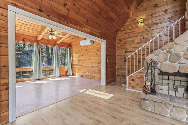 48 Thistle Ln, Sidney, ME 04330 - unfurnished living room with vaulted ceiling, wooden ceiling, a ceiling fan, stairs, and wood finished floors