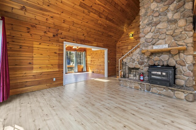 48 Thistle Ln, Sidney, ME 04330 - unfurnished living room with wood finished floors, wooden ceiling, wood walls, stairway, and high vaulted ceiling