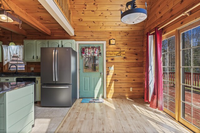 48 Thistle Ln, Sidney, ME 04330 - kitchen with freestanding refrigerator, wooden walls, wooden ceiling with exposed beams, green cabinets, and a sink