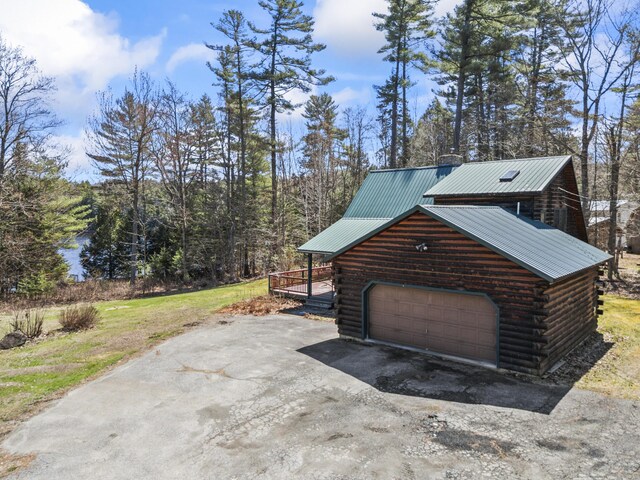 48 Thistle Ln, Sidney, ME 04330 - garage with driveway