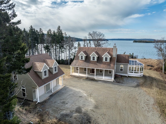 aerial view featuring a water view