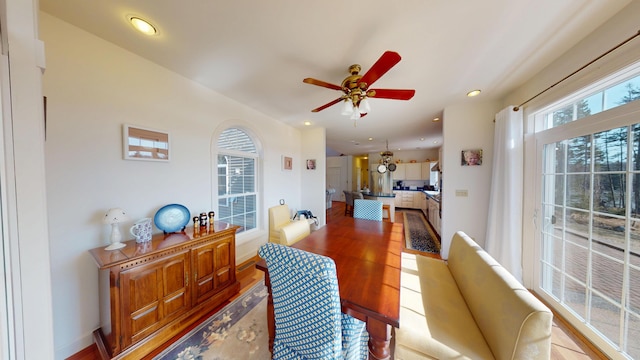 dining space featuring recessed lighting, ceiling fan, and wood finished floors