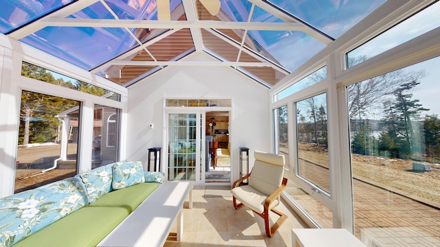 sunroom featuring outdoor lounge area