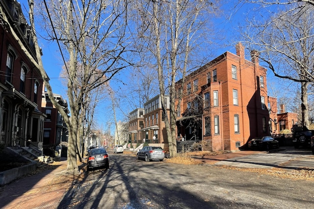 55 Carleton St Unit A, Portland, ME 04102 - view of asphalt road with sidewalks and curbs