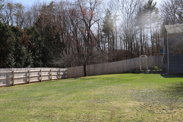 view of yard featuring a fenced backyard
