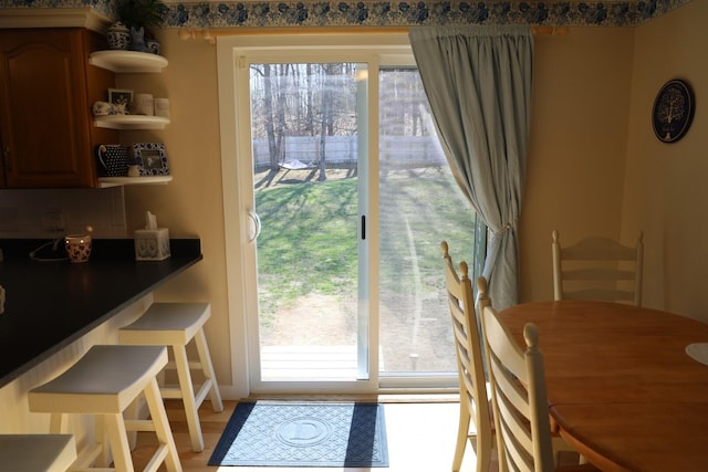 entryway with a healthy amount of sunlight and light wood-style flooring