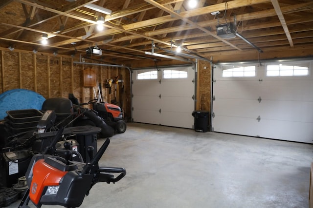 garage featuring a garage door opener