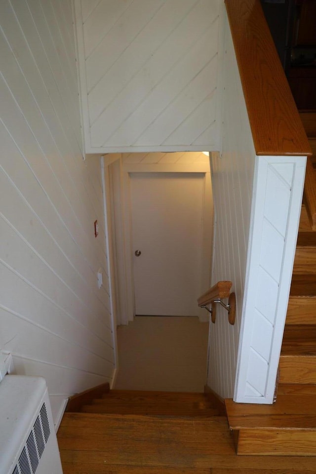 corridor with wood finished floors