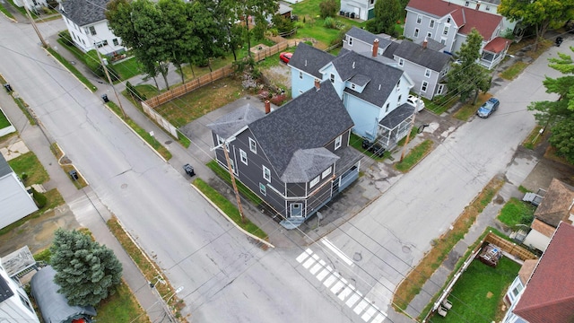 birds eye view of property with a residential view