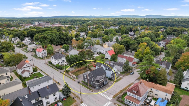 birds eye view of property featuring a residential view and a mountain view