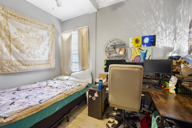 bedroom featuring wood finished floors