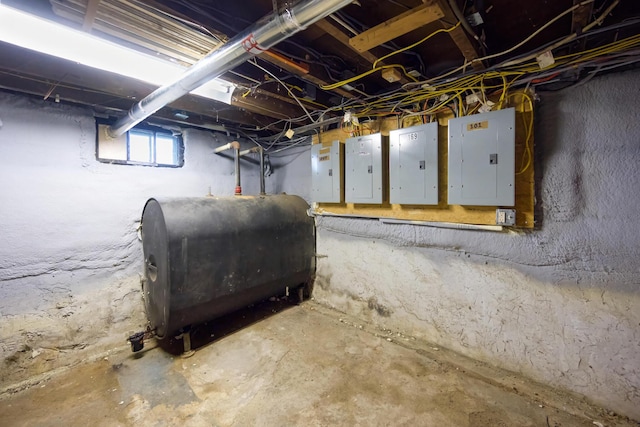 basement featuring heating fuel and electric panel