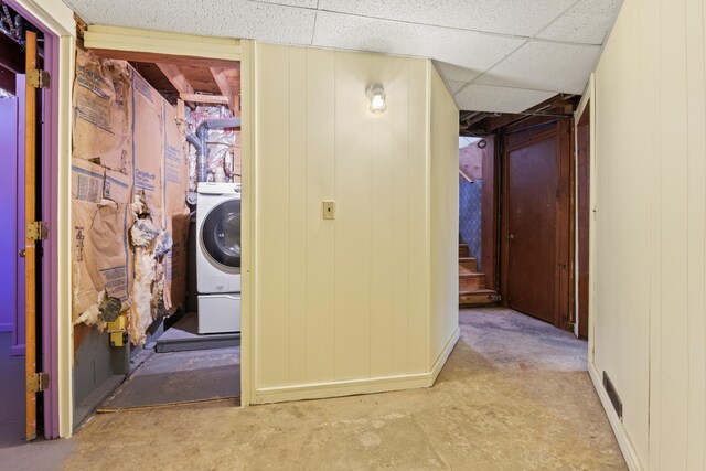 laundry room featuring washer / dryer and laundry area