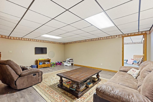 living room featuring light wood-style flooring and baseboards