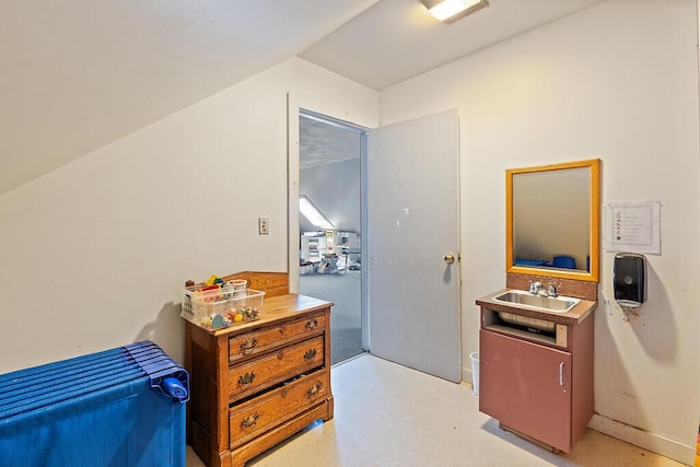 bedroom featuring a sink
