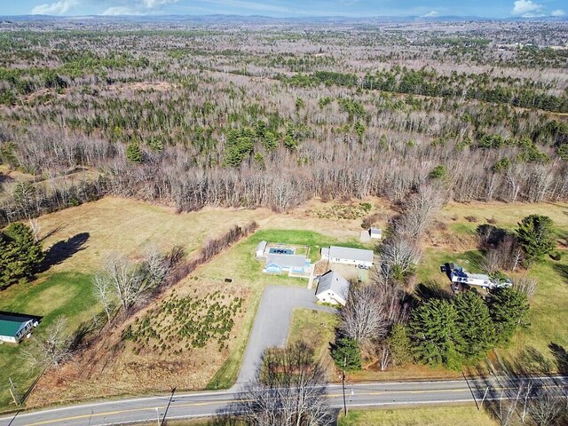 aerial view featuring a view of trees