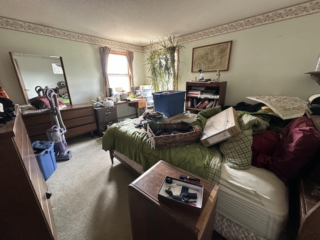 carpeted bedroom featuring a textured ceiling