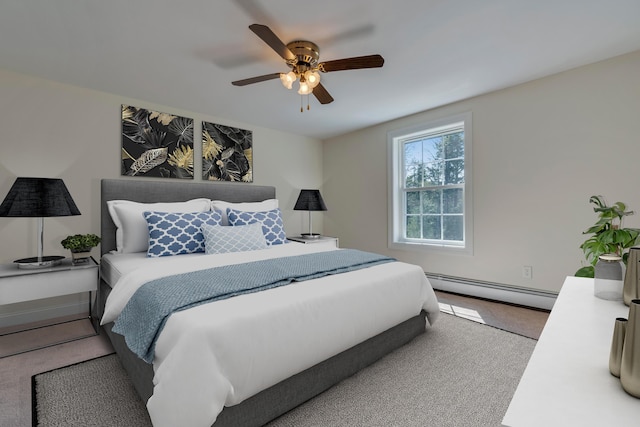 bedroom featuring a baseboard heating unit, carpet floors, and ceiling fan