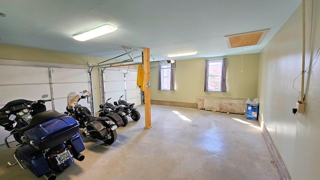 garage featuring baseboards