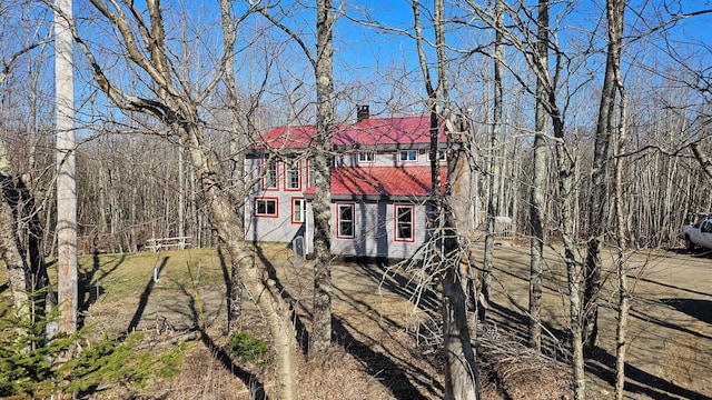 view of front of property with a chimney