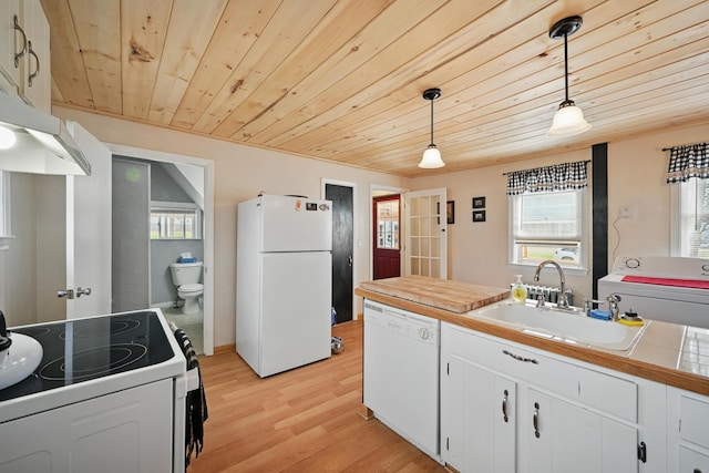 126 Elm St, Newport, ME 04953 - kitchen with a sink, light wood-style floors, white appliances, washer / clothes dryer, and wood ceiling